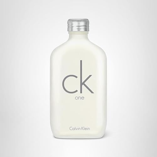 CK One bottle against neutral background conveying confident, inclusive style.