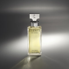 Packaging box beside Calvin Klein Eternity bottle, presenting a polished gift-ready look.