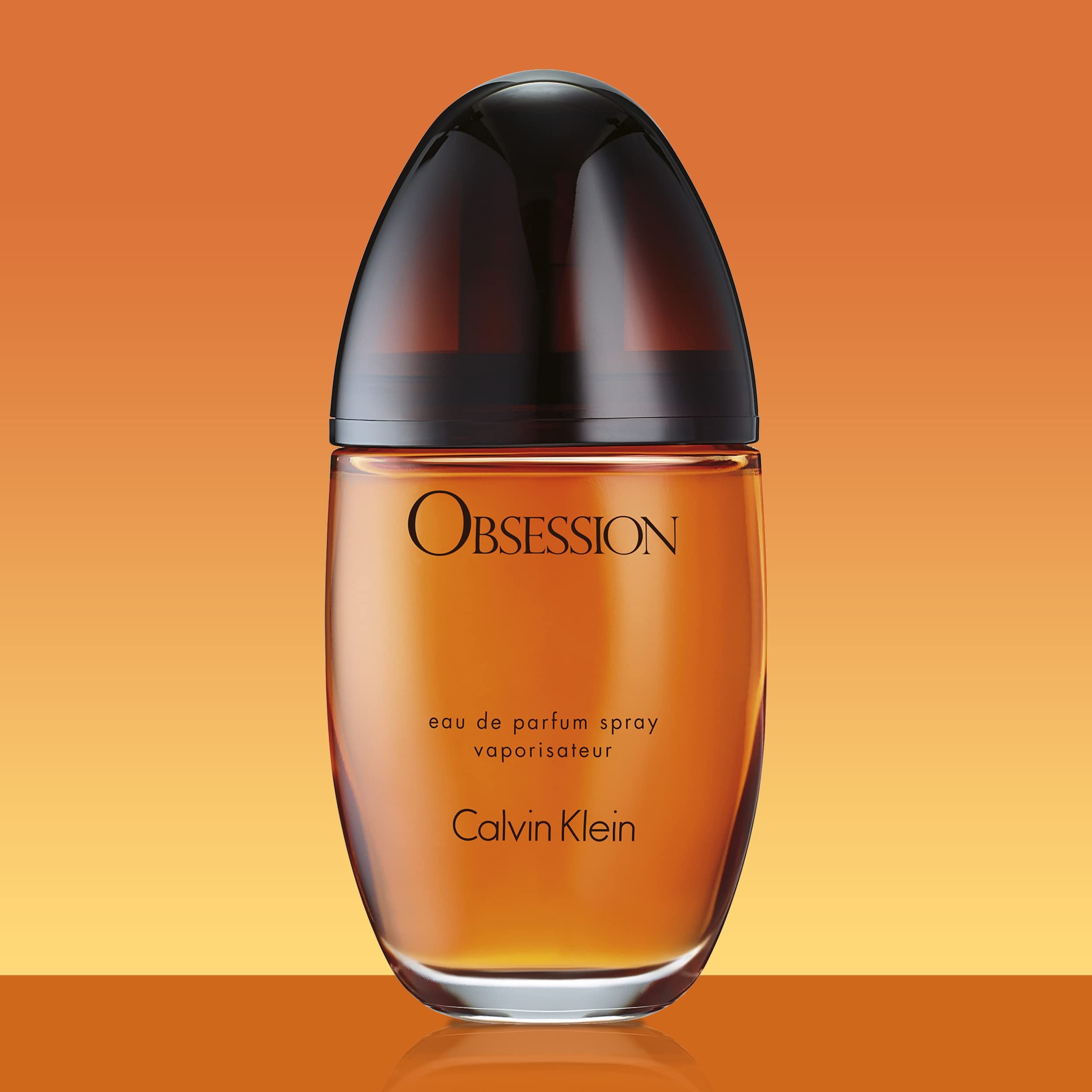 Calvin Klein Obsession amber-spice notes image emphasizes warm, intoxicating scent profile.