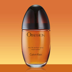 Calvin Klein Obsession amber-spice notes image emphasizes warm, intoxicating scent profile.