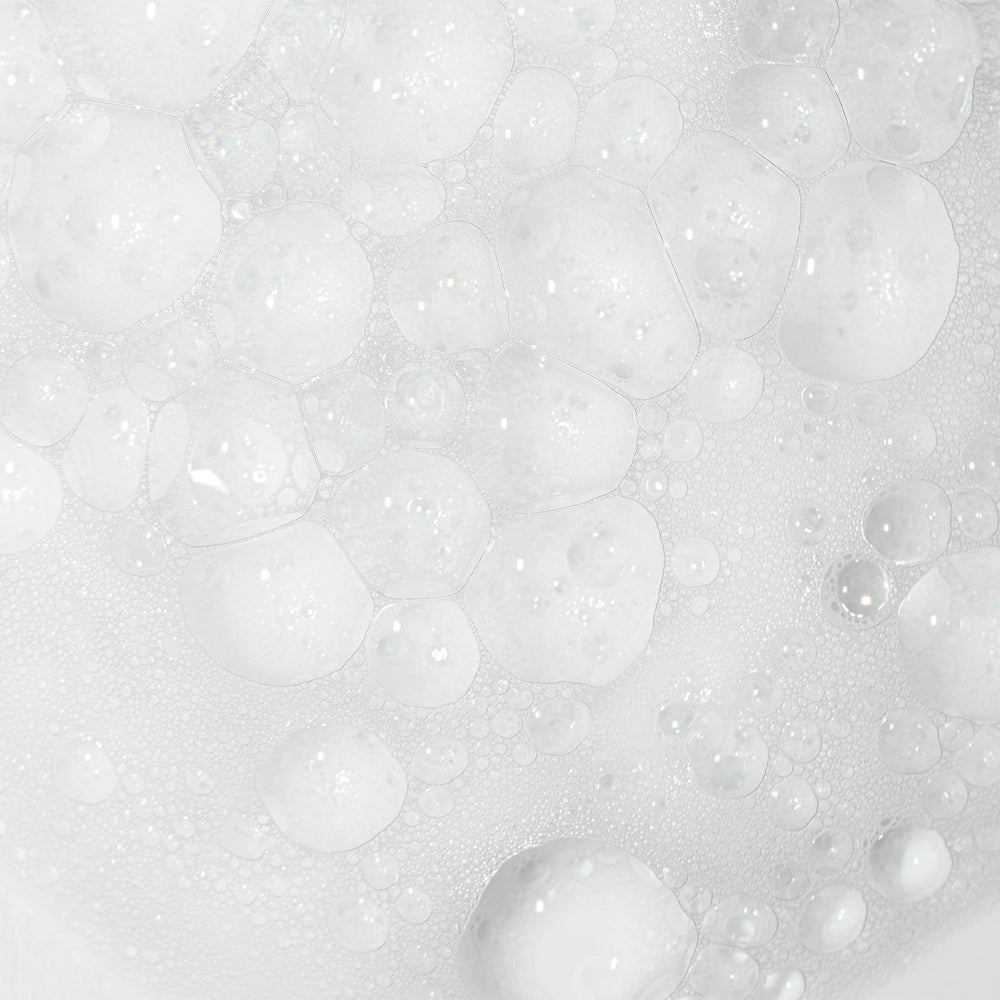 Camille Rose Curl and Detangler Spray leaves curls shiny and soft with Sweet Dew scent.