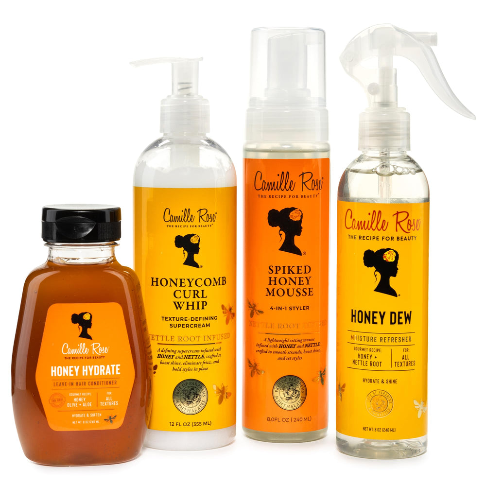 Camille Rose Curl and Detangler Spray packaging highlighting natural ingredients.