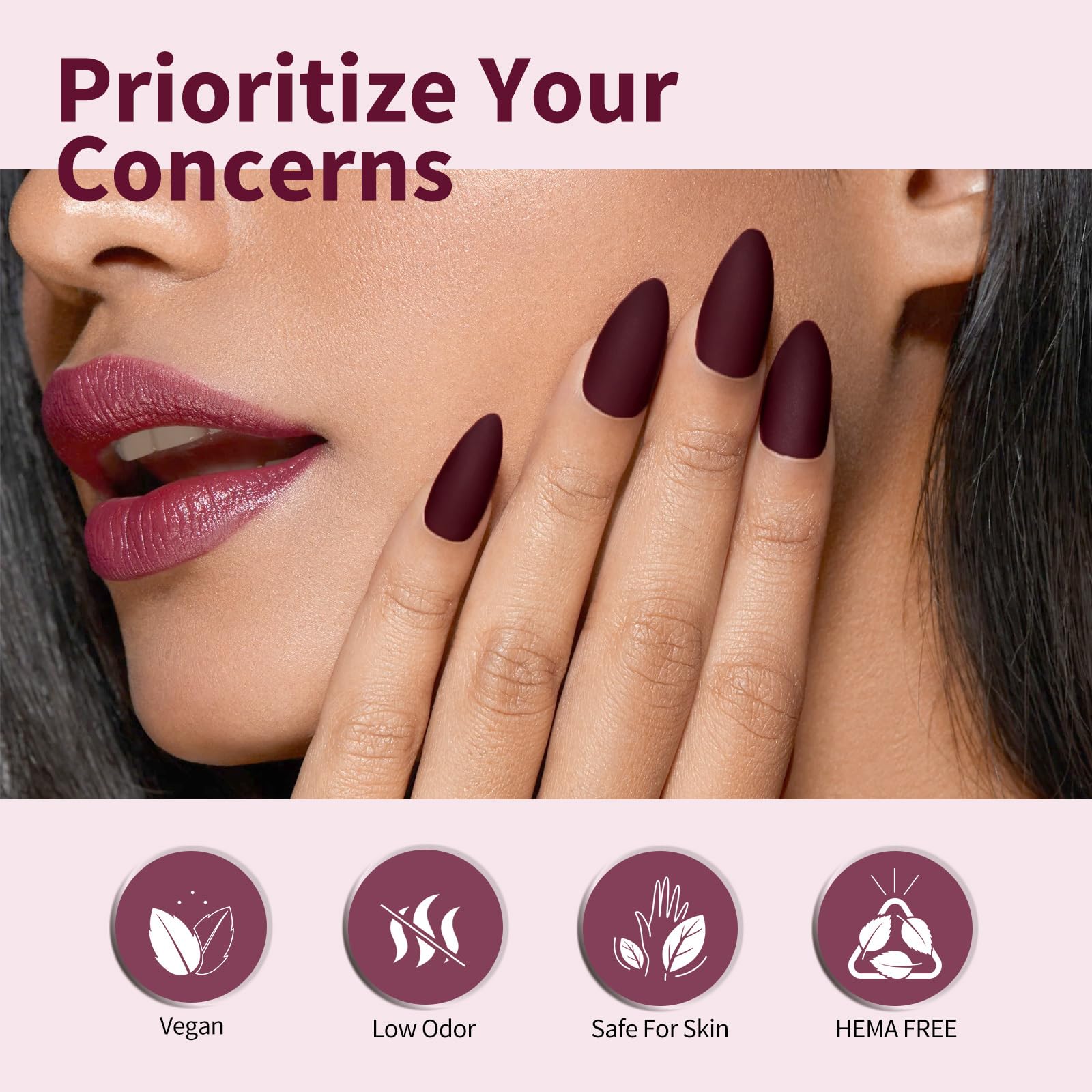 Hands wearing CANNI burgundy gel nails during daily activities