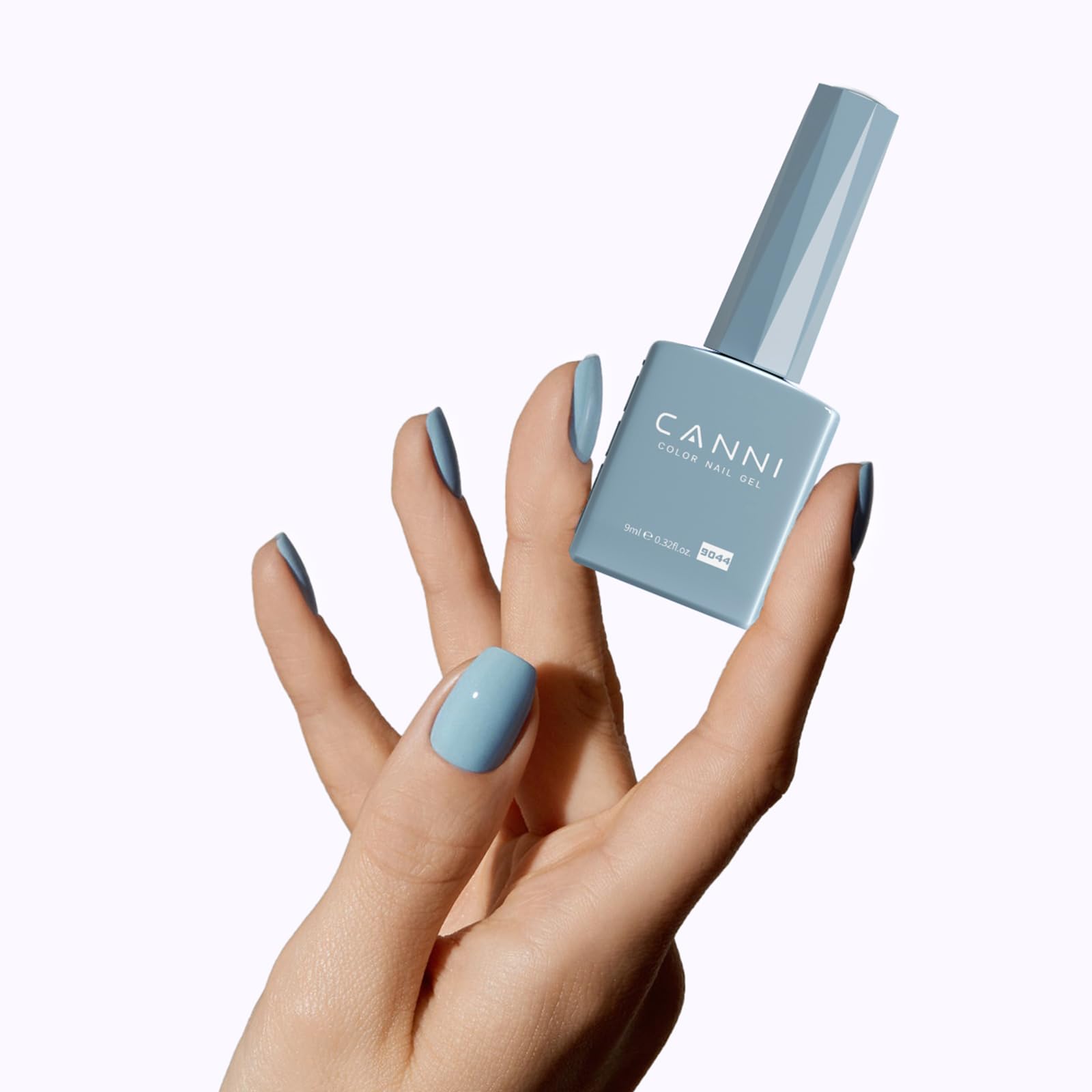 CANNI Light Blue polish side-view highlights glossy depth for a premium manicure.