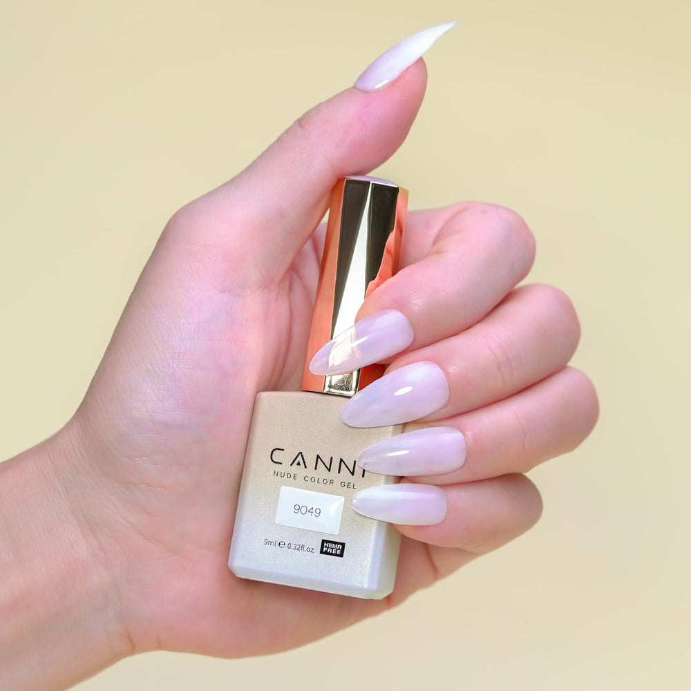 CANNI Milky White nails finished with natural nude shine