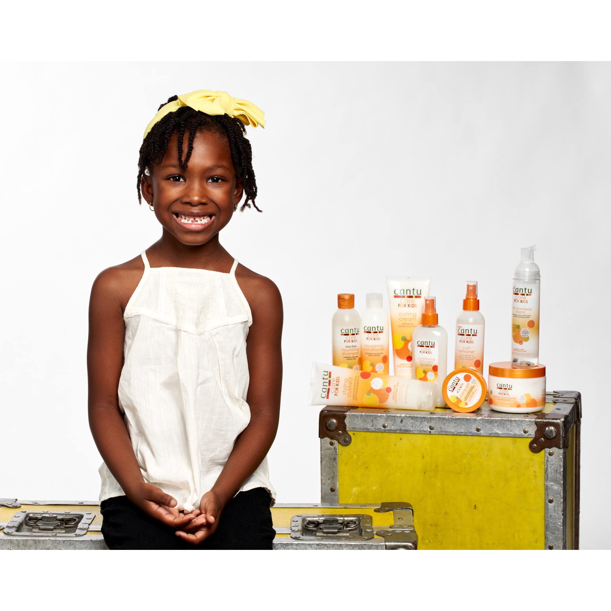 Cantu Care for Kids Leave-In Conditioner packaging on shelf.