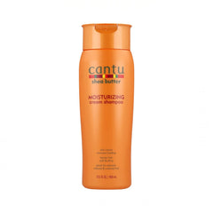 Cantu champú crema manteca de karité en frasco para hidratación suave y brillo.