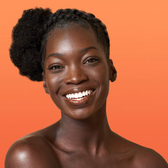 Cantu Grow Strong highlights shea butter ingredient for deep moisture.