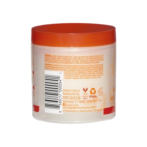 Cantu Grow Strong texture close-up reveals hydrated, shiny hair.