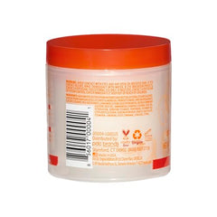 Cantu Grow Strong texture close-up reveals hydrated, shiny hair.