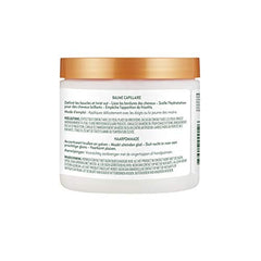 Cantu Hair Dressing Pomade with Shea Butter hair-definition shot shows curled strands held softly.