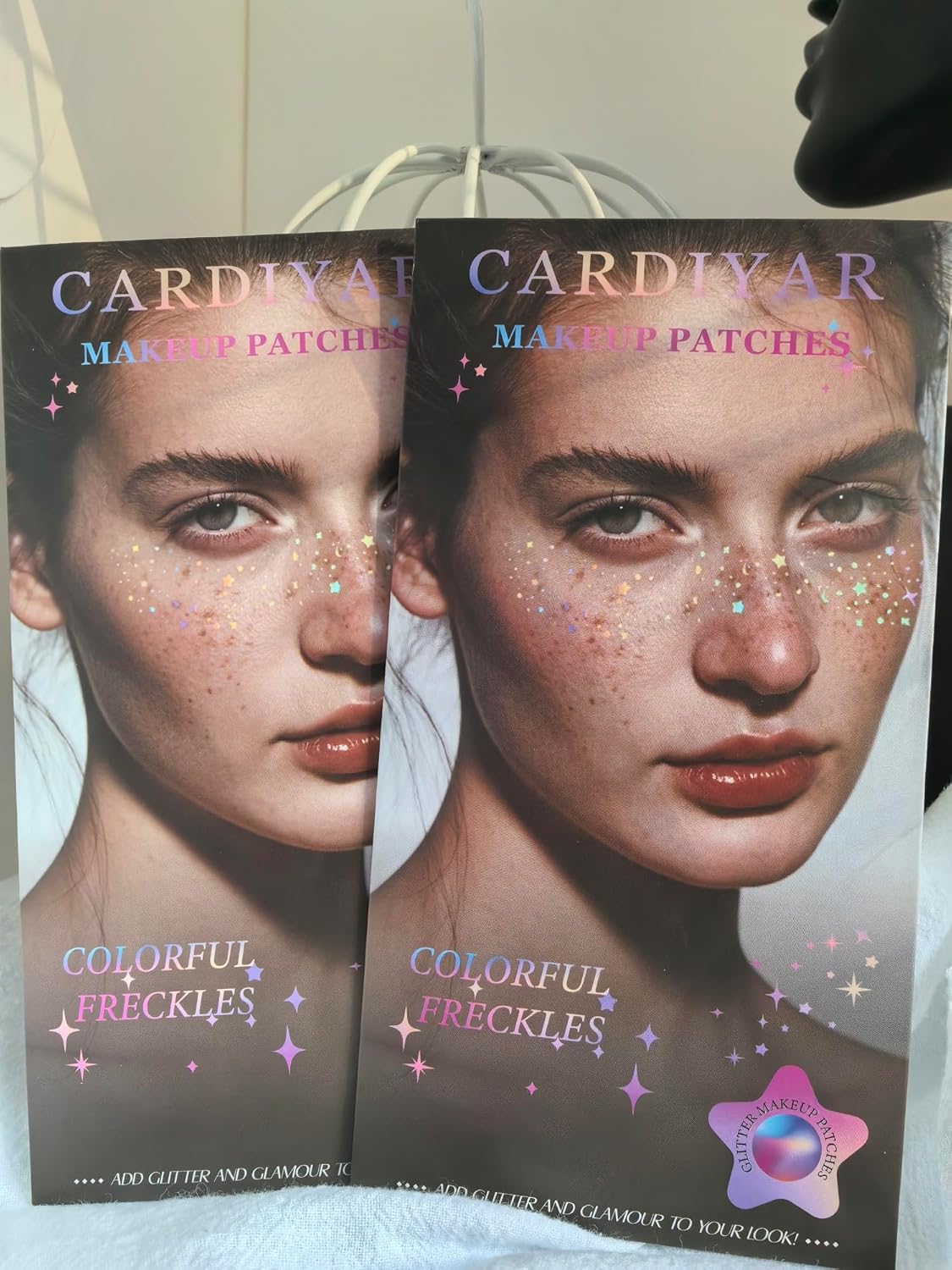 Cardiyar gold glitter patches applied to skin for bold sparkle.