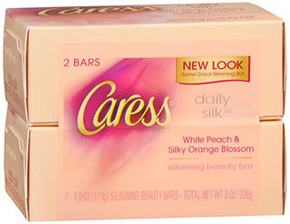 Caress barra belleza seda diaria, limpieza suave y fragancia ligera para manos y cuerpo.