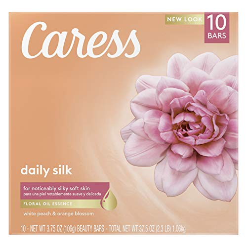 Caress Daily Silk espuma cremosa durante la ducha.