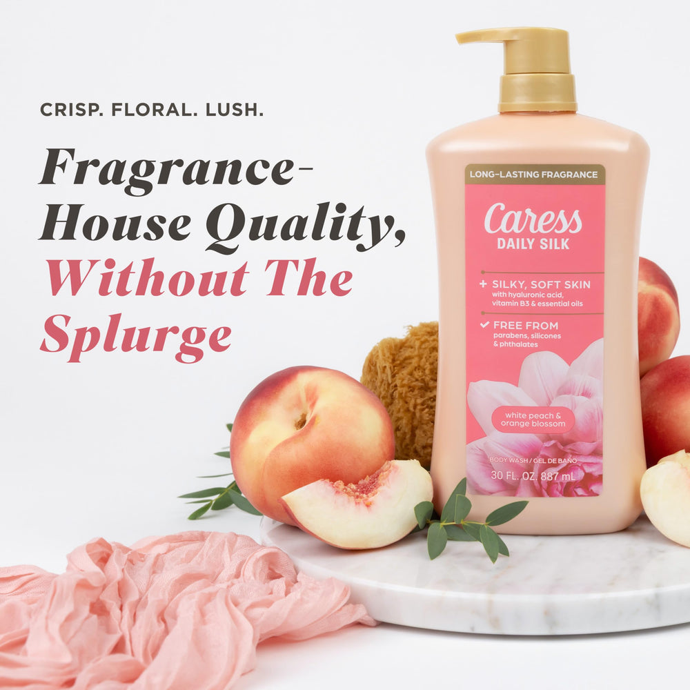 Caress Daily Silk orange blossom note highlights fresh floral aroma in shower.
