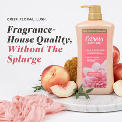Caress Daily Silk orange blossom note highlights fresh floral aroma in shower.