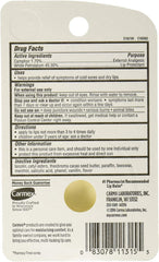 Carmex lip balm dispenser close-up showing cooling camphor and menthol action.