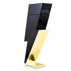 Carolina Herrera Bad Boy scent blends cocoa, tonka bean, and amberwood for depth.
