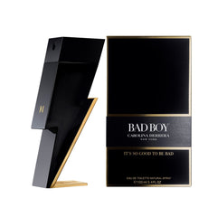 Carolina Herrera Bad Boy bottle heart notes cedar and sage convey magnetic elegance.