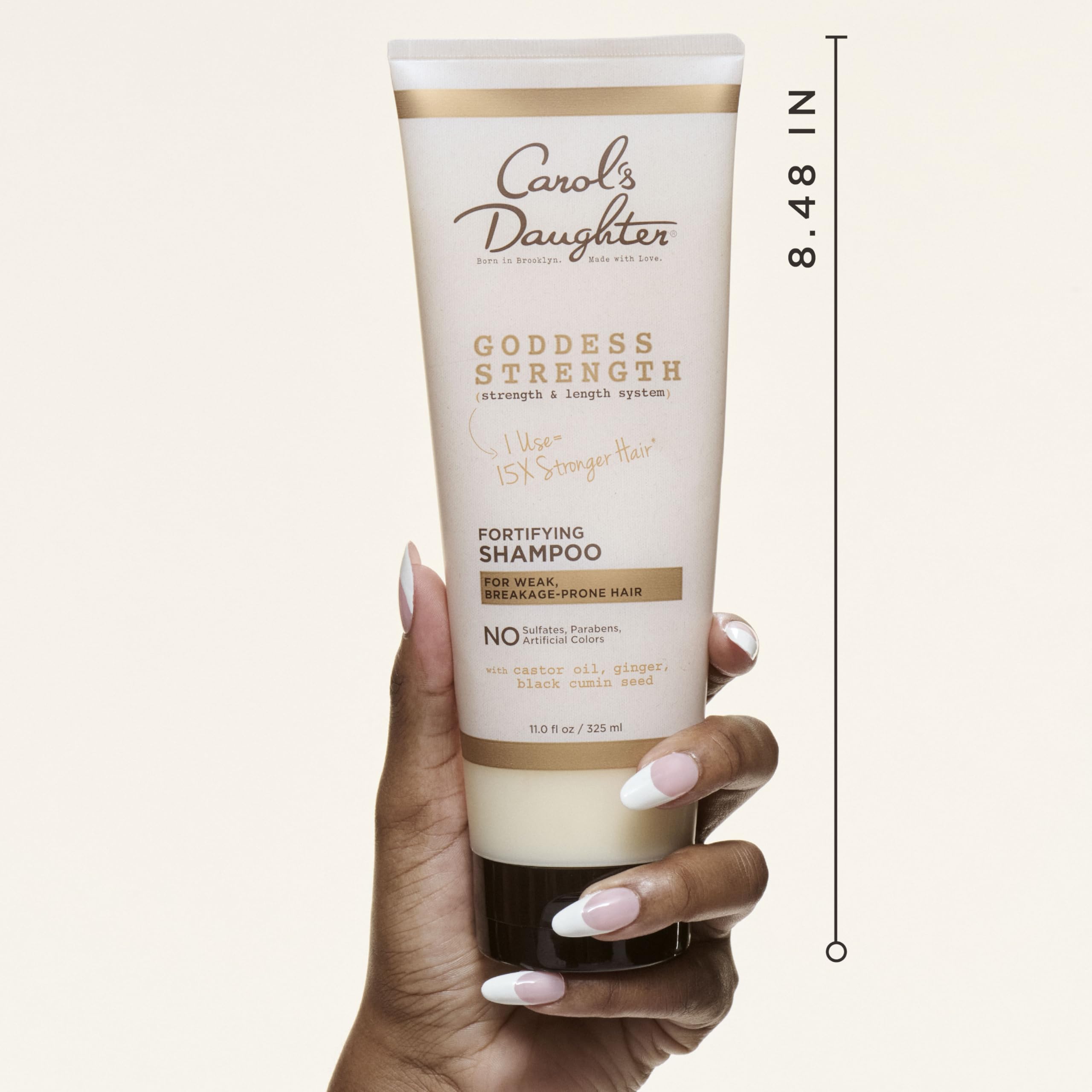 Goddess Strength de Carol's Daughter, botella con aceites nutre cabellos rizados y frágiles.