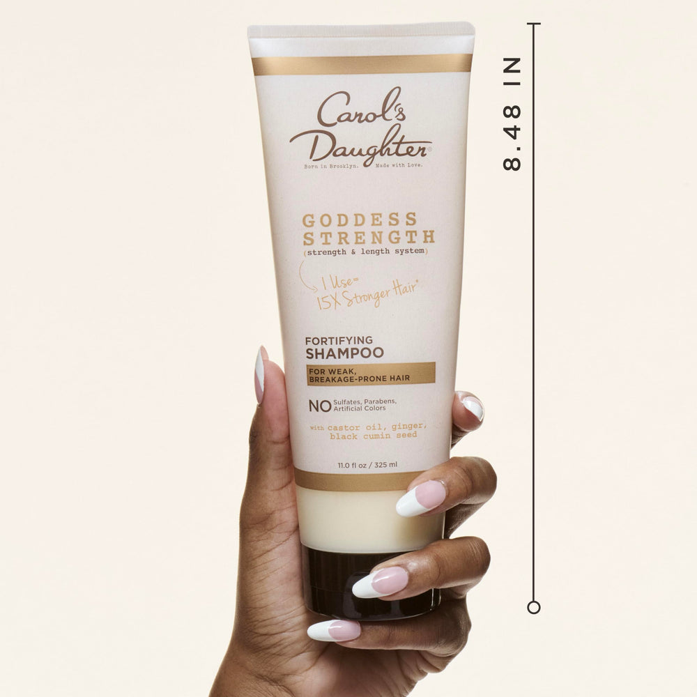Goddess Strength de Carol's Daughter, botella con aceites nutre cabellos rizados y frágiles.