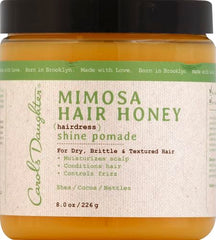 Etiqueta de Carol's Daughter Mimosa Hair Honey Shine Pomade muestra ingredientes nutritivos para rizos