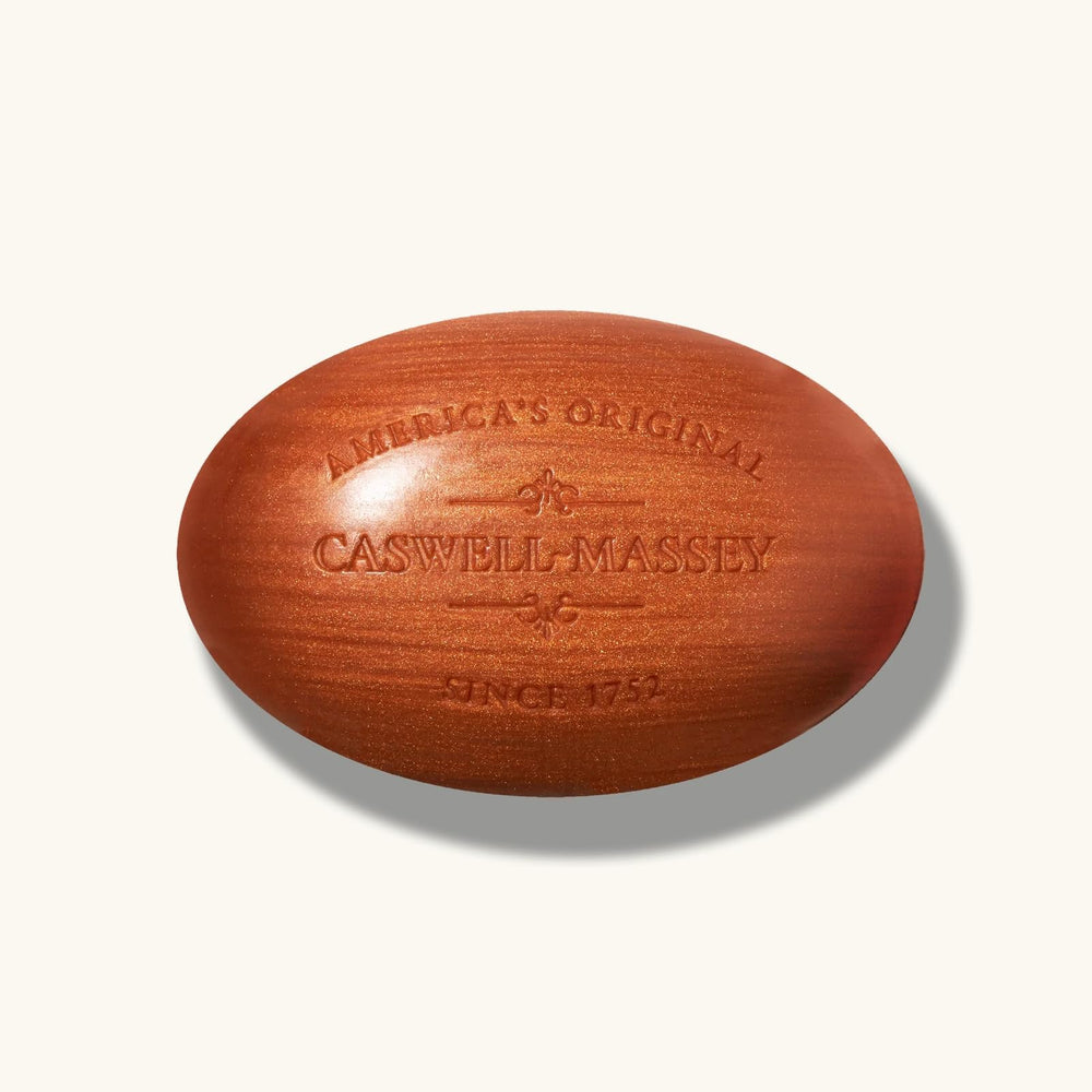 Caswell-Massey Heritage Woodgrain Sandalwood soap in a bath scene