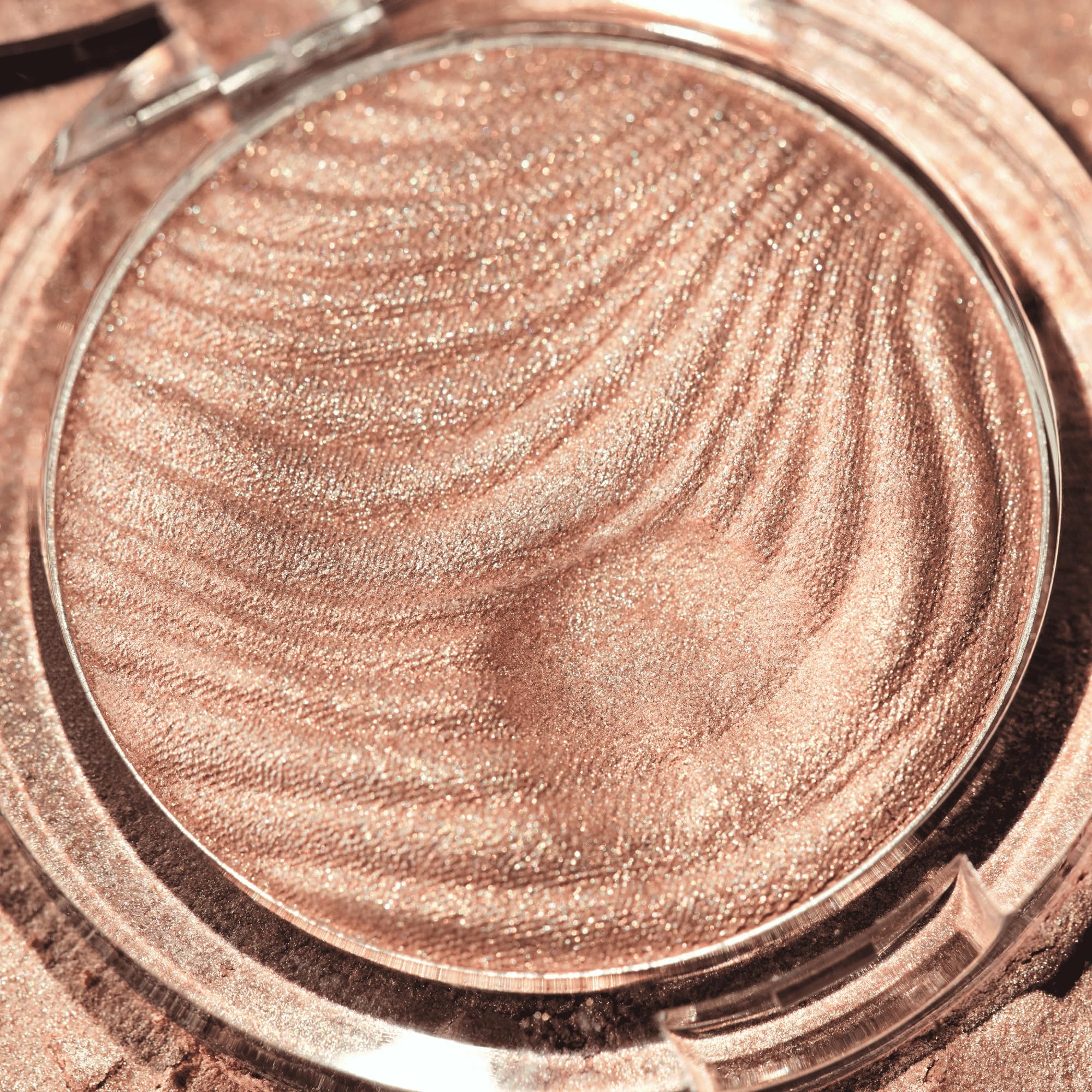 Catrice Aura Glam Bouncy Highlighter used on eyes and lips for subtle sparkle