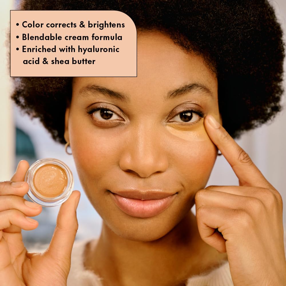 Catrice Under Eye Brightener application finger demonstrates easy, quick blending for a natural finish.