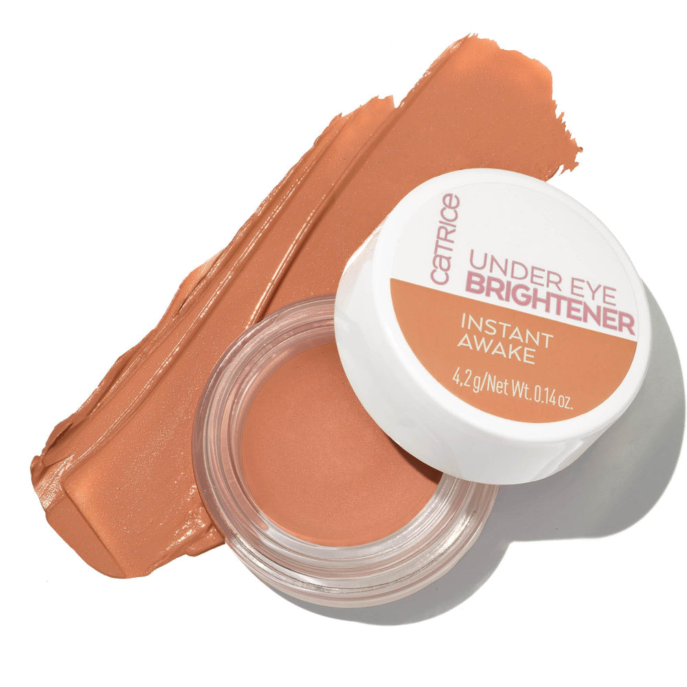 Close-up of the tube shows creamy texture ideal for smooth under-eye blending.