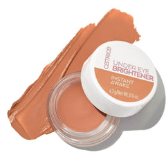 Close-up of the tube shows creamy texture ideal for smooth under-eye blending.