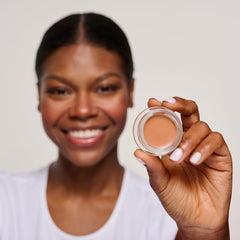 Under-eye swatch application shows brightening effect against bluish shadows.