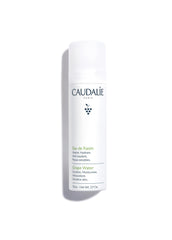 Caudalie agua de uva: neblina facial para hidratación ligera durante el viaje.