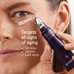 Caudalie Premier Cru eye cream jar close up shows rich texture and pearlizers for brightness