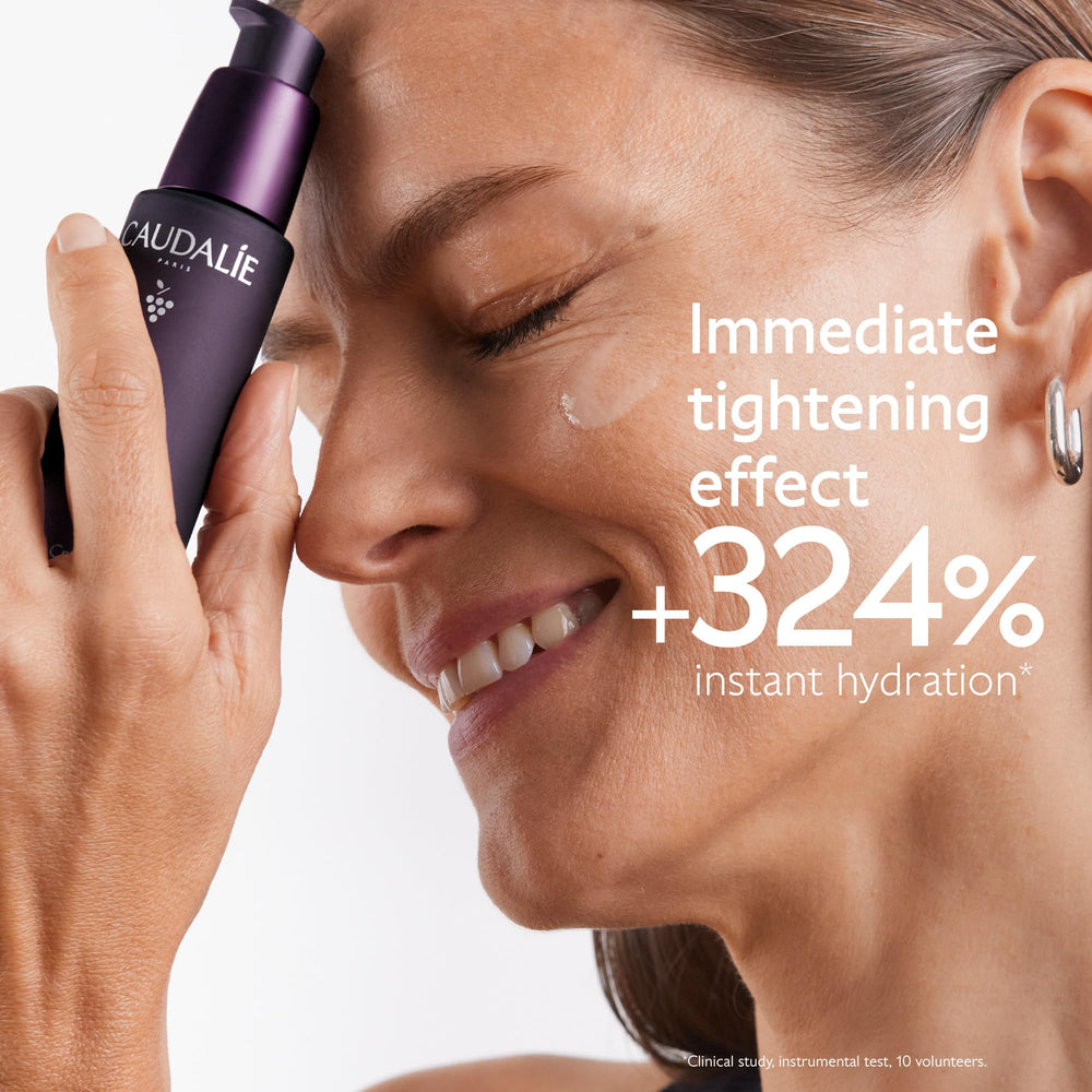Caudalie Premier Cru serum texture close-up showing creamy hydration.
