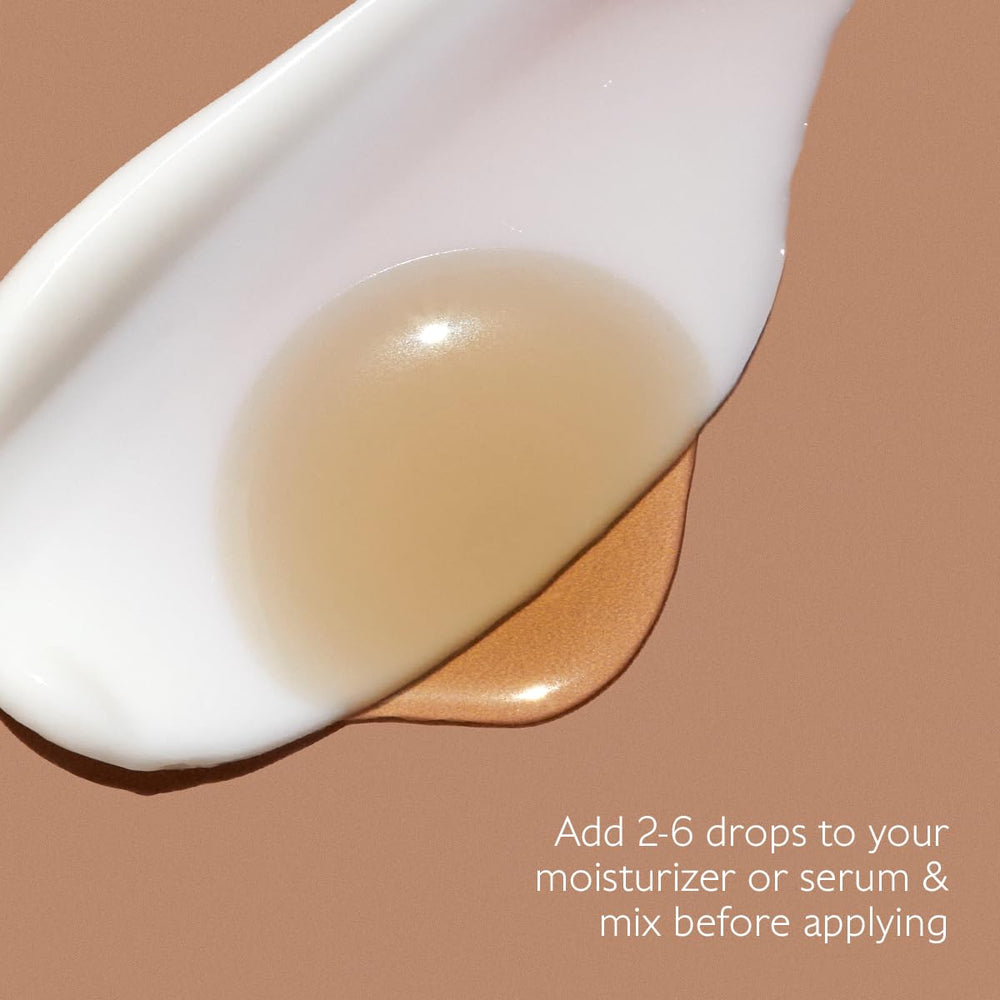 Caudalie Self-Tan Sun Drops neck application for seamless blend.