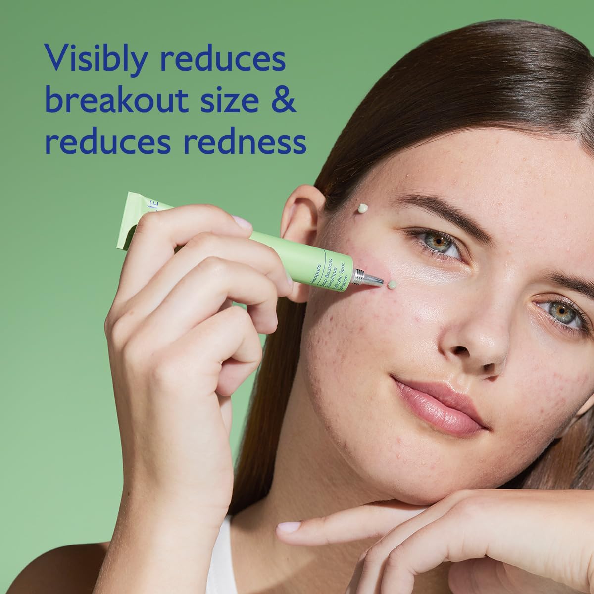 Caudalie Vinopure targeted spot application demonstrating precise dab on blemish.