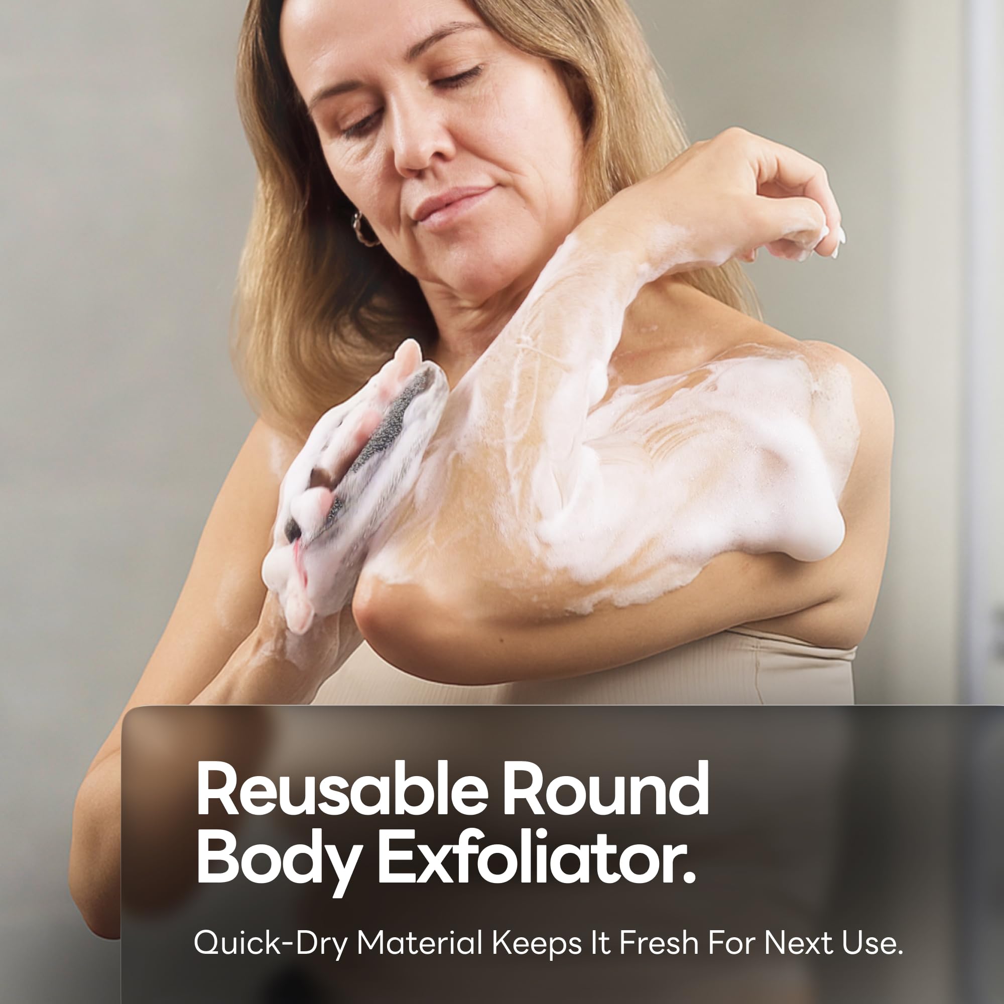 Caveem exfoliante corporal con diseño redondo y correa para agarre estable.