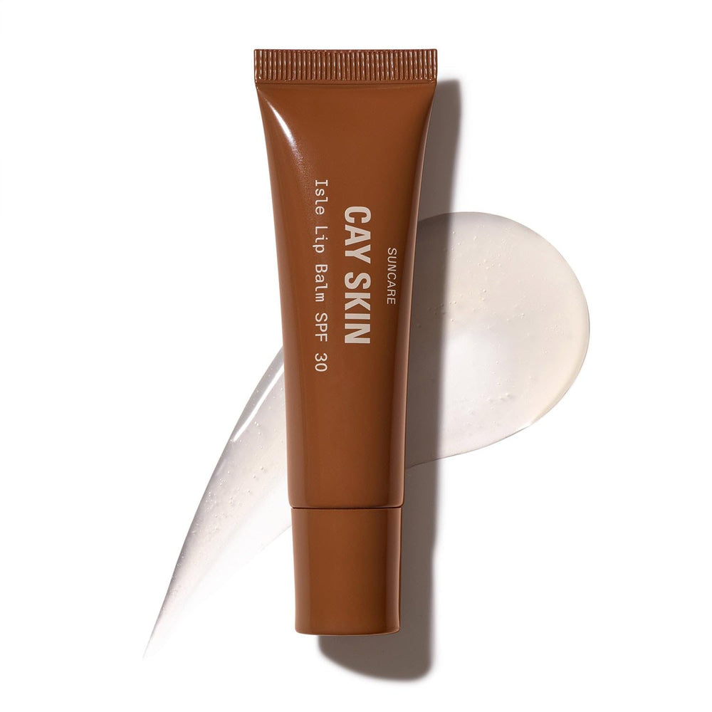 Cay Skin Isle Lip Balm SPF 30 con brillo translúcido para labios hidratados.