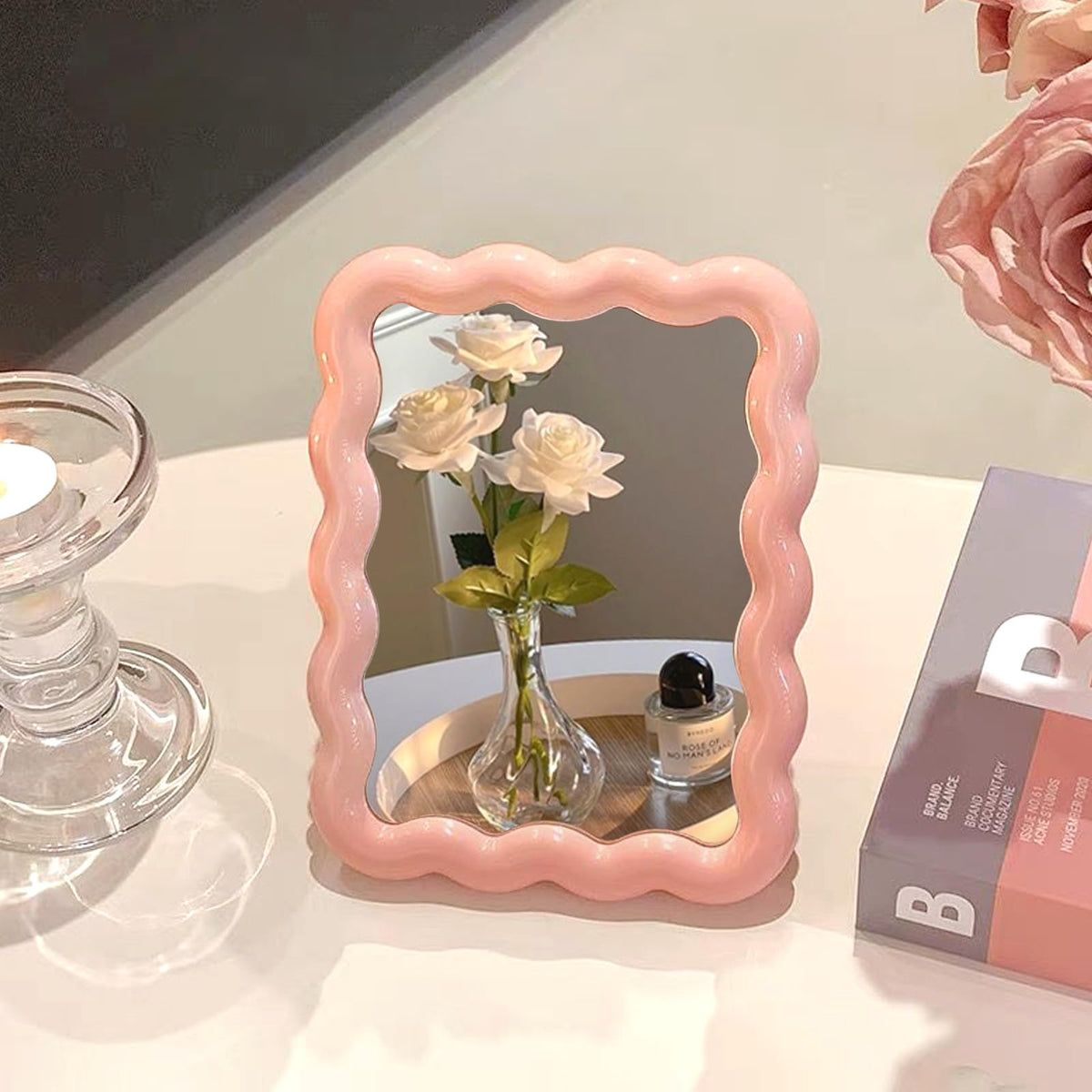 CCREDONE Wave-shaped desk mirror on vanity offering a clear view for makeup.