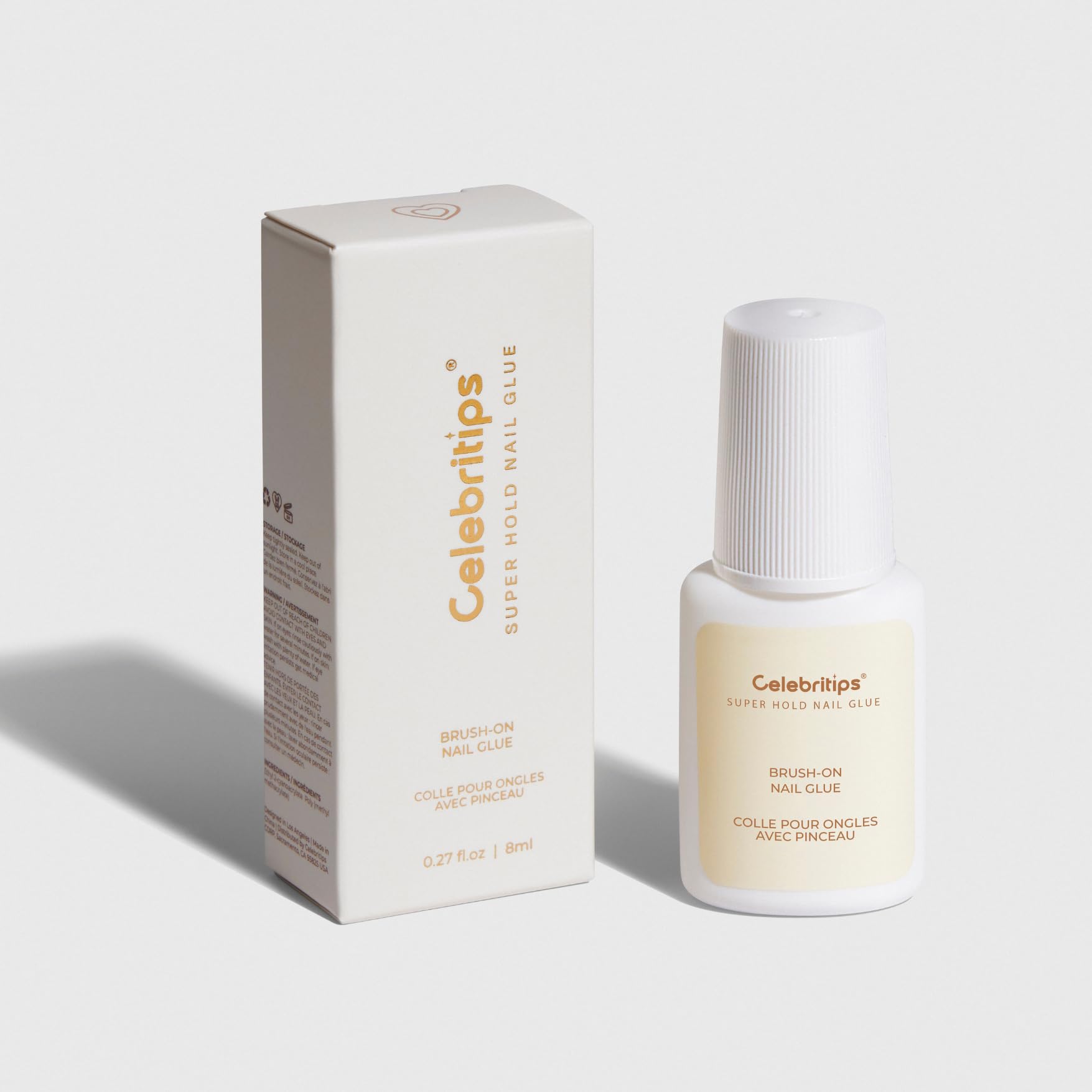Celebritips Super-Hold Nail Glue bottle with precise brush for smooth, controlled application.