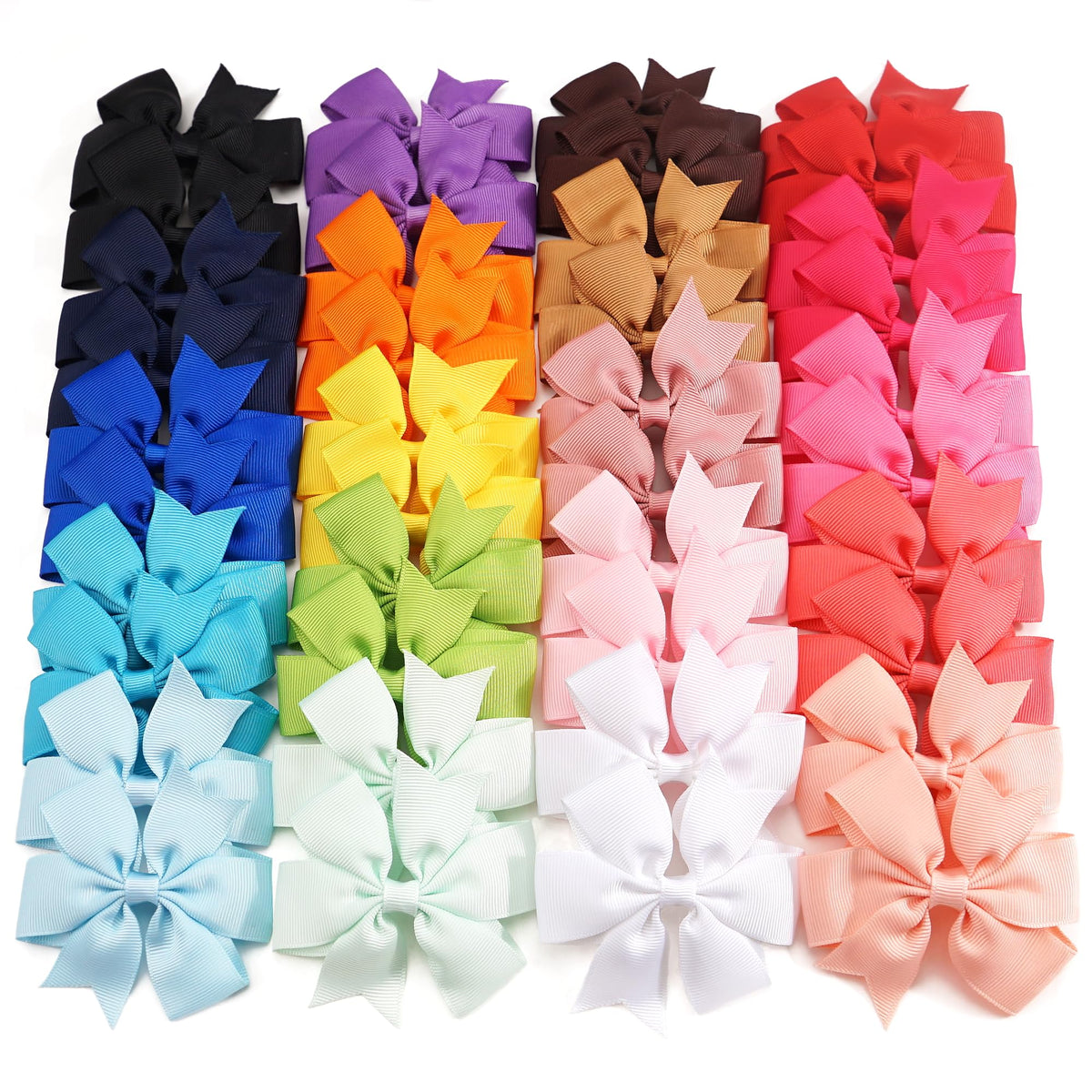 CÉLLOT pink pinwheel bow on a secure alligator clip for playtime styling