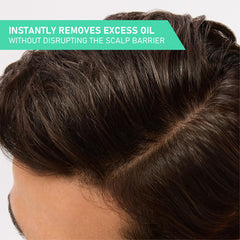 CeraVe Oil Control Balancing Shampoo pour shot showing quick application and cleansing action.