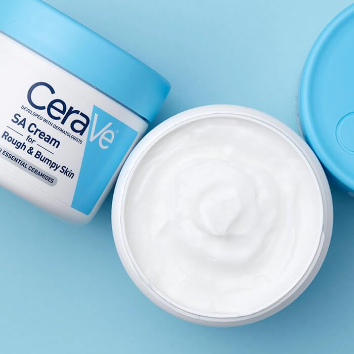 CeraVe SA Cream packaging displayed on a bathroom shelf.