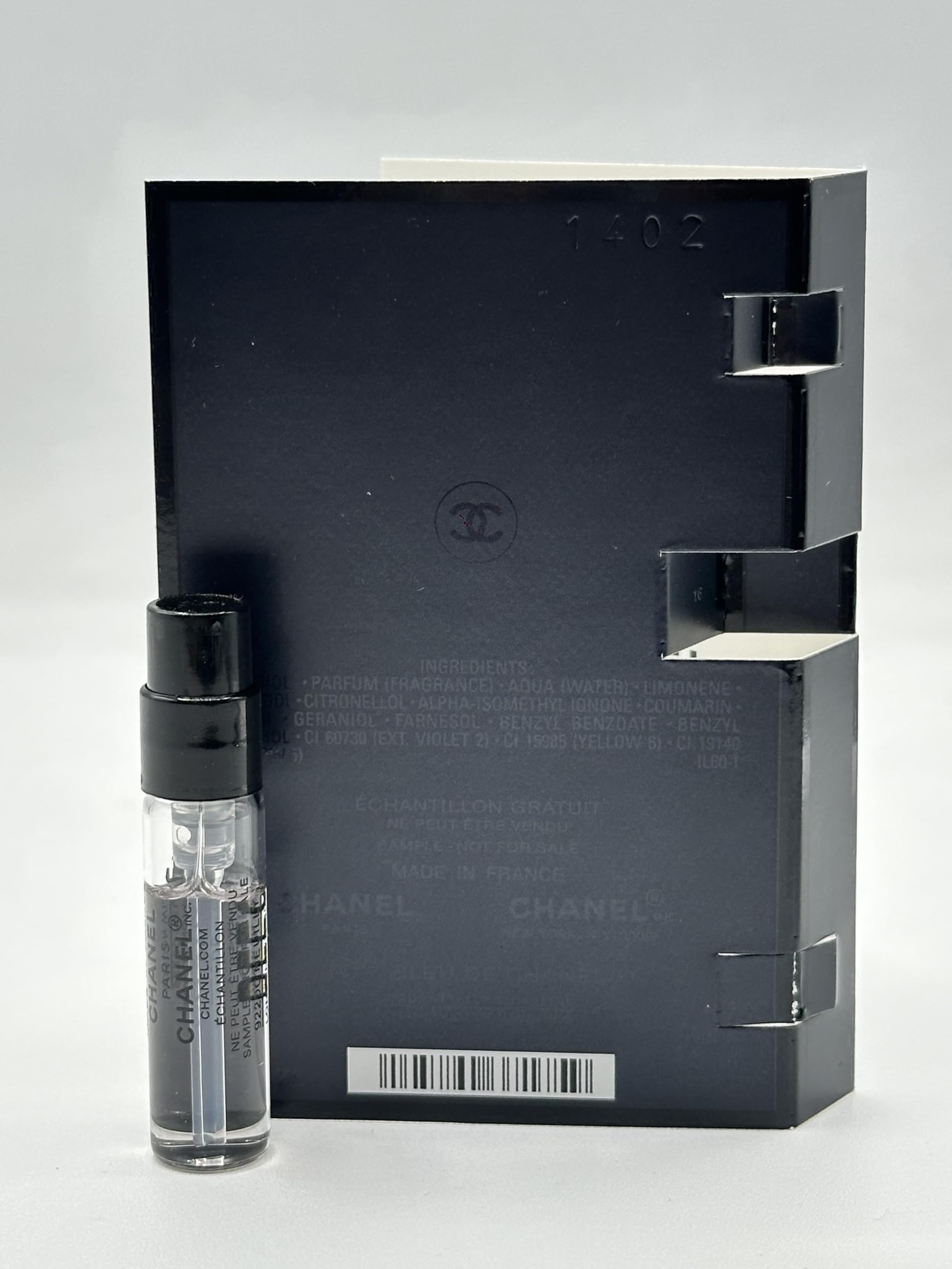 CHANEL Bleu de Parfum Pour Homme swatch on wood desk, suggests versatile daily wear