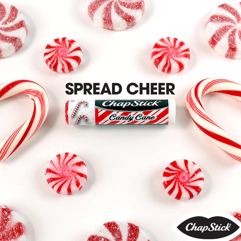 ChapStick Candy Cane balm resting in desk drawer for daily moisture.