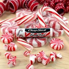 ChapStick Candy Cane lip balm on palm showing smooth glide and minty scent.