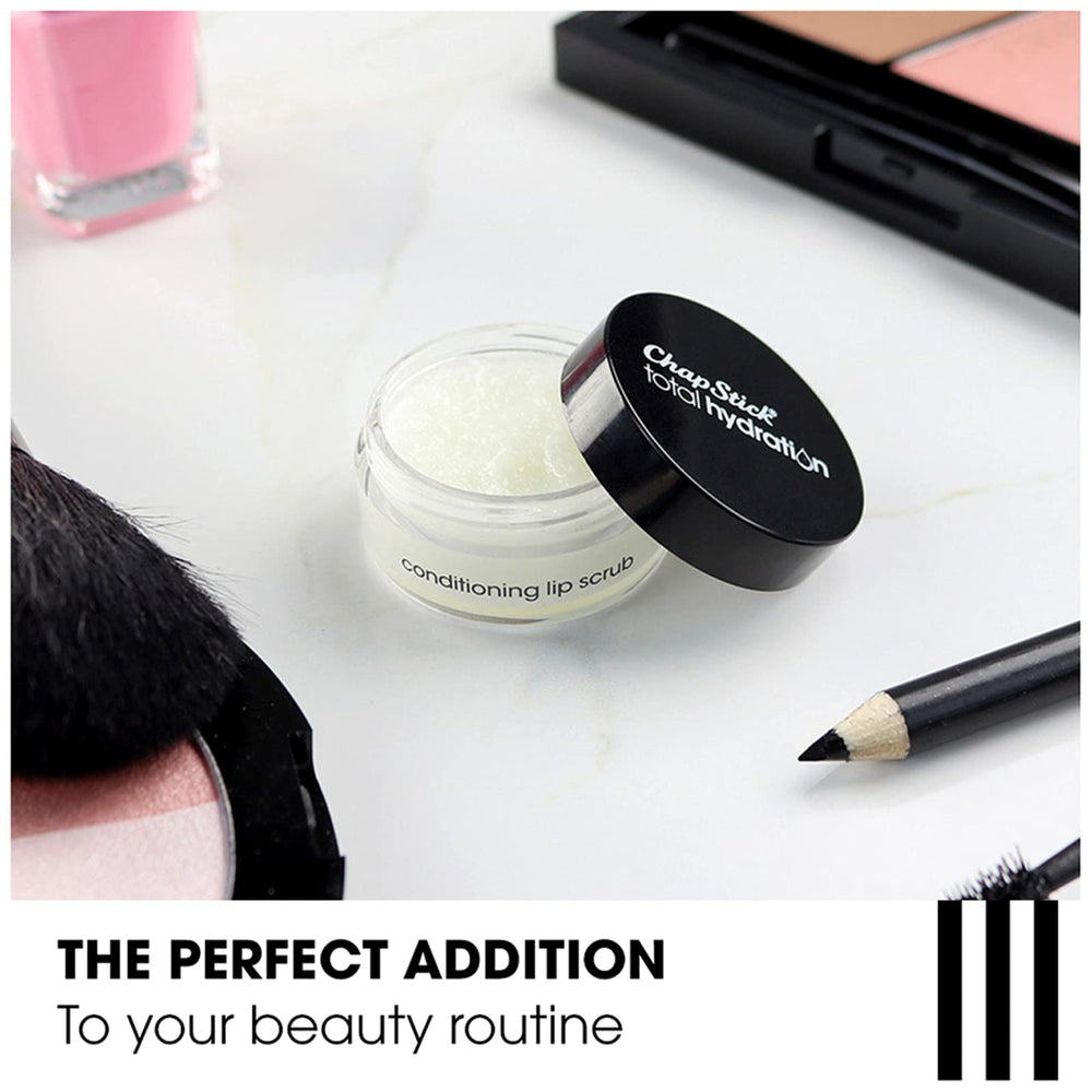 Applying ChapStick Sugar Plum Scrub to lips for exfoliation and renewal