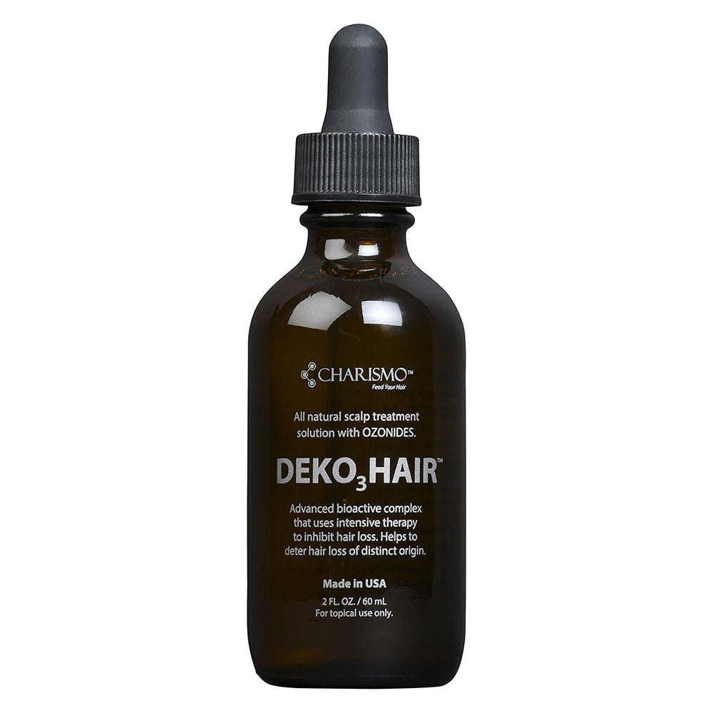 Charismo Dekohair serum bottle pour for precise scalp application and easy dosing.