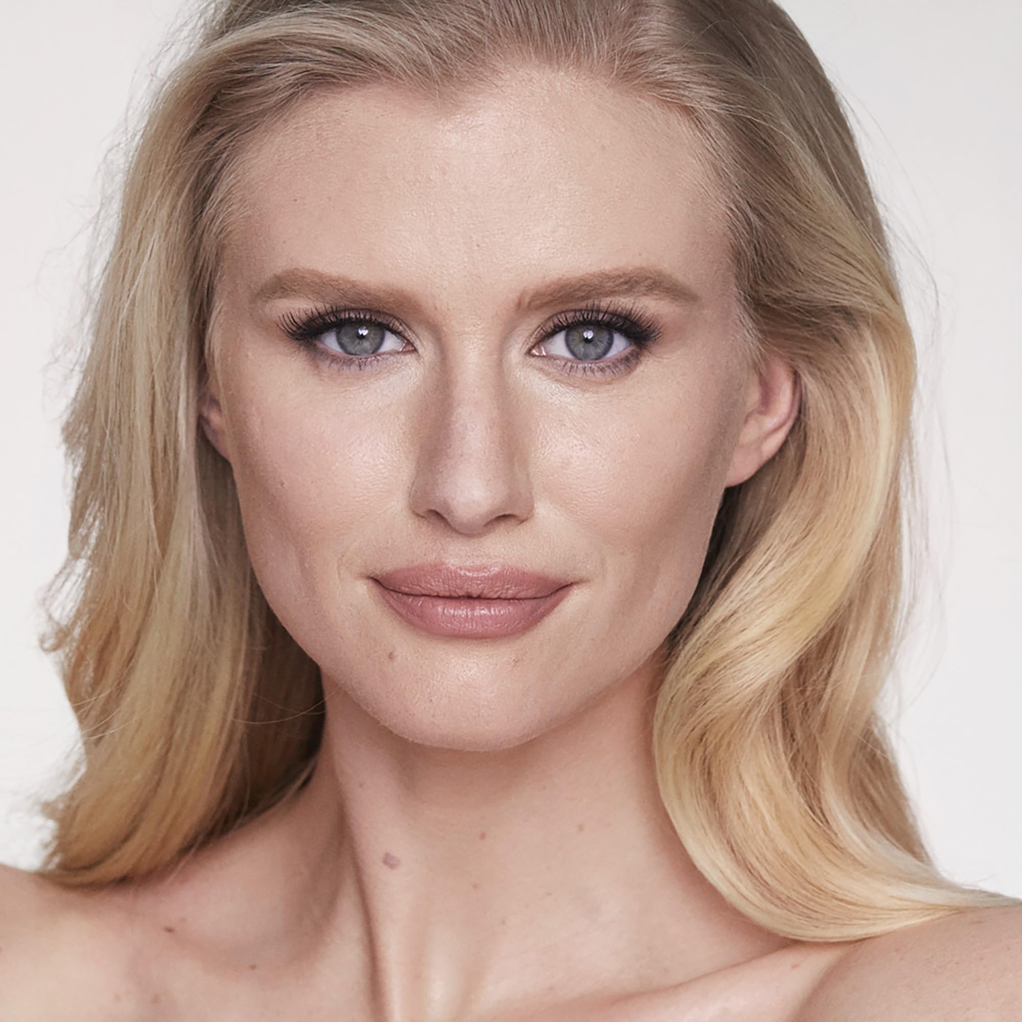 Charlotte Tilbury Airbrush Bronzer pairs with foundation for a cohesive airbrushed look.